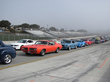 Vintage Muscle Cars Line Up for Parade Lap
